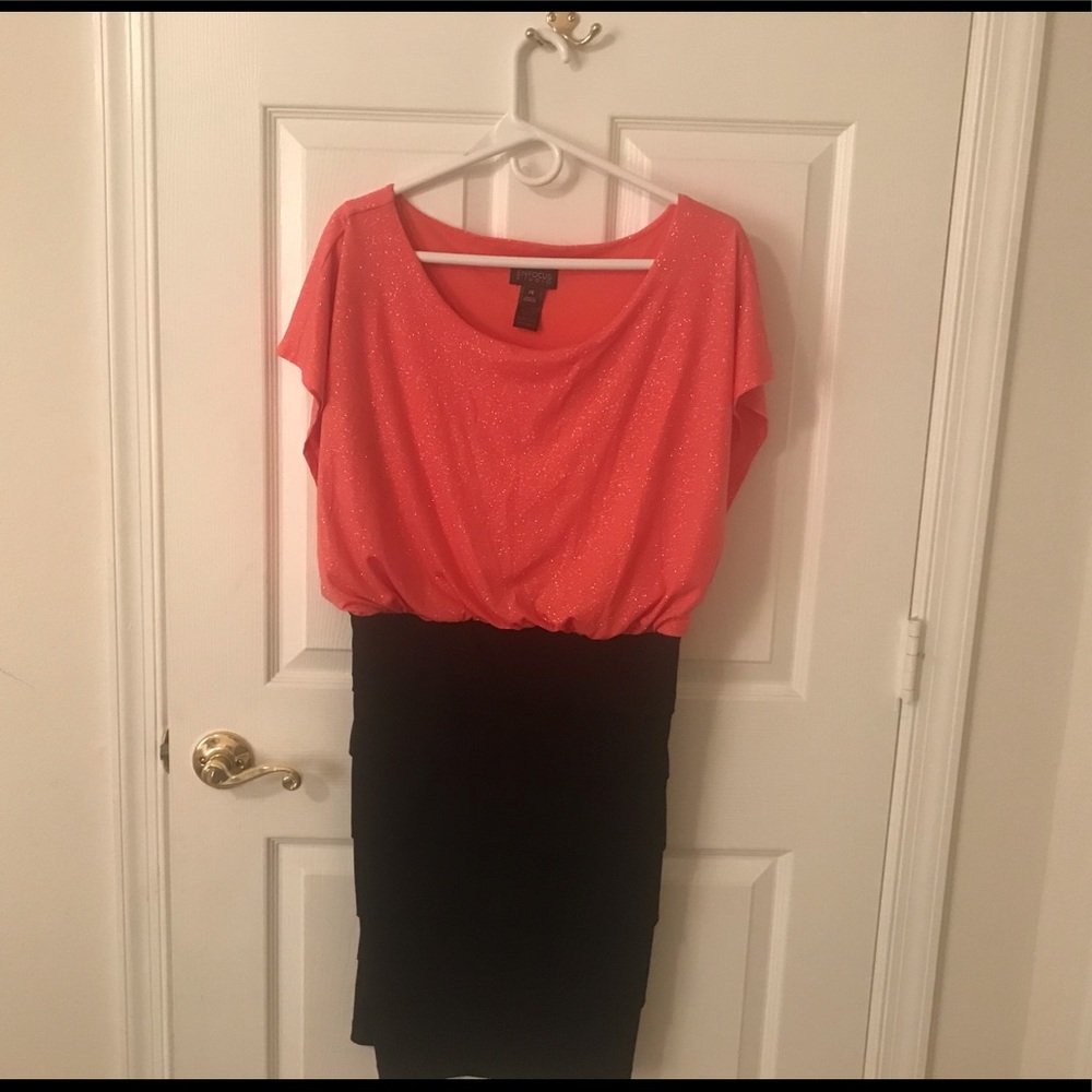 Beautiful knee length semi-formal dress.